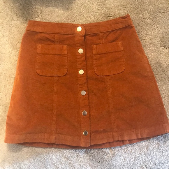 orange button up skirt